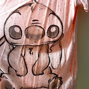 Stitch v-neck design on front and back